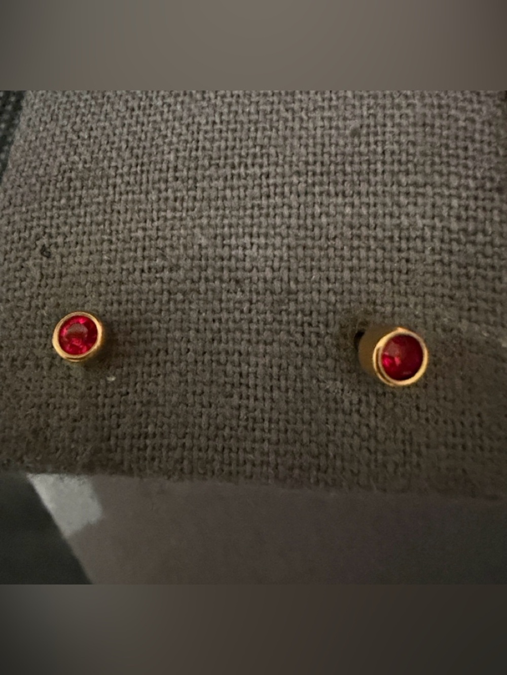 Dainty gold-toned bezel-set Ruby stud Birthstone pierced earrings - used